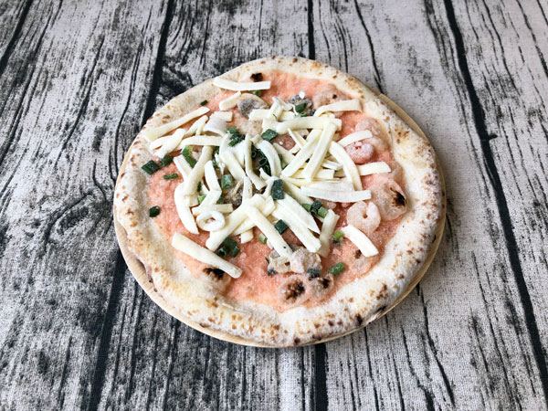 冷凍状態の明太子シーフードピッツァ